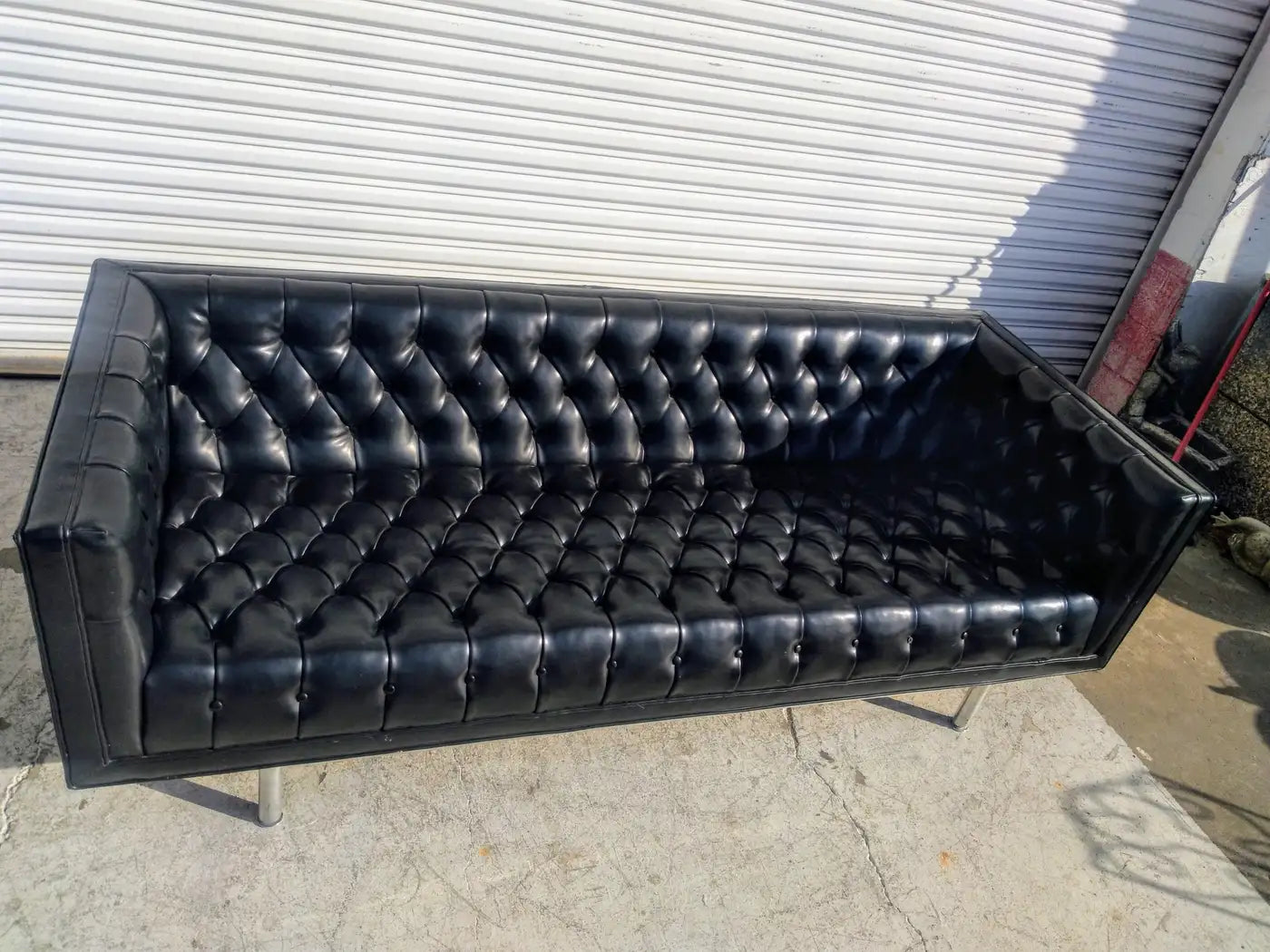 Vintage MCM faux leather couch with even arms