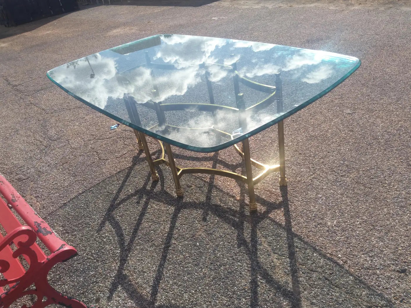 Luxury brass and glass dining table in neoclassical style