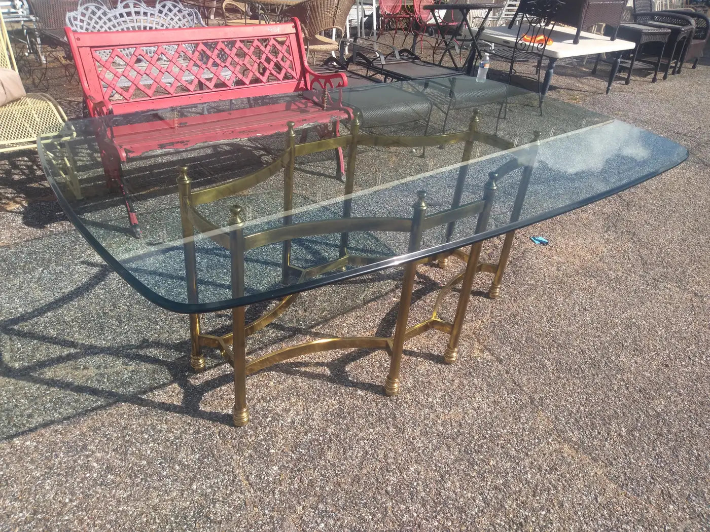Maison Bagues brass and glass dining table for luxury interiors