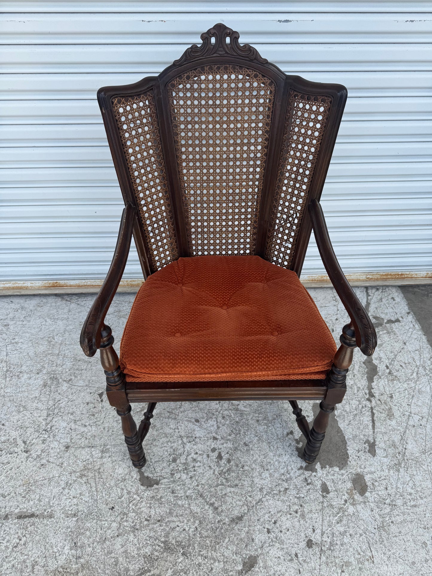 Antique Carved Wood Armchair with Cane Back