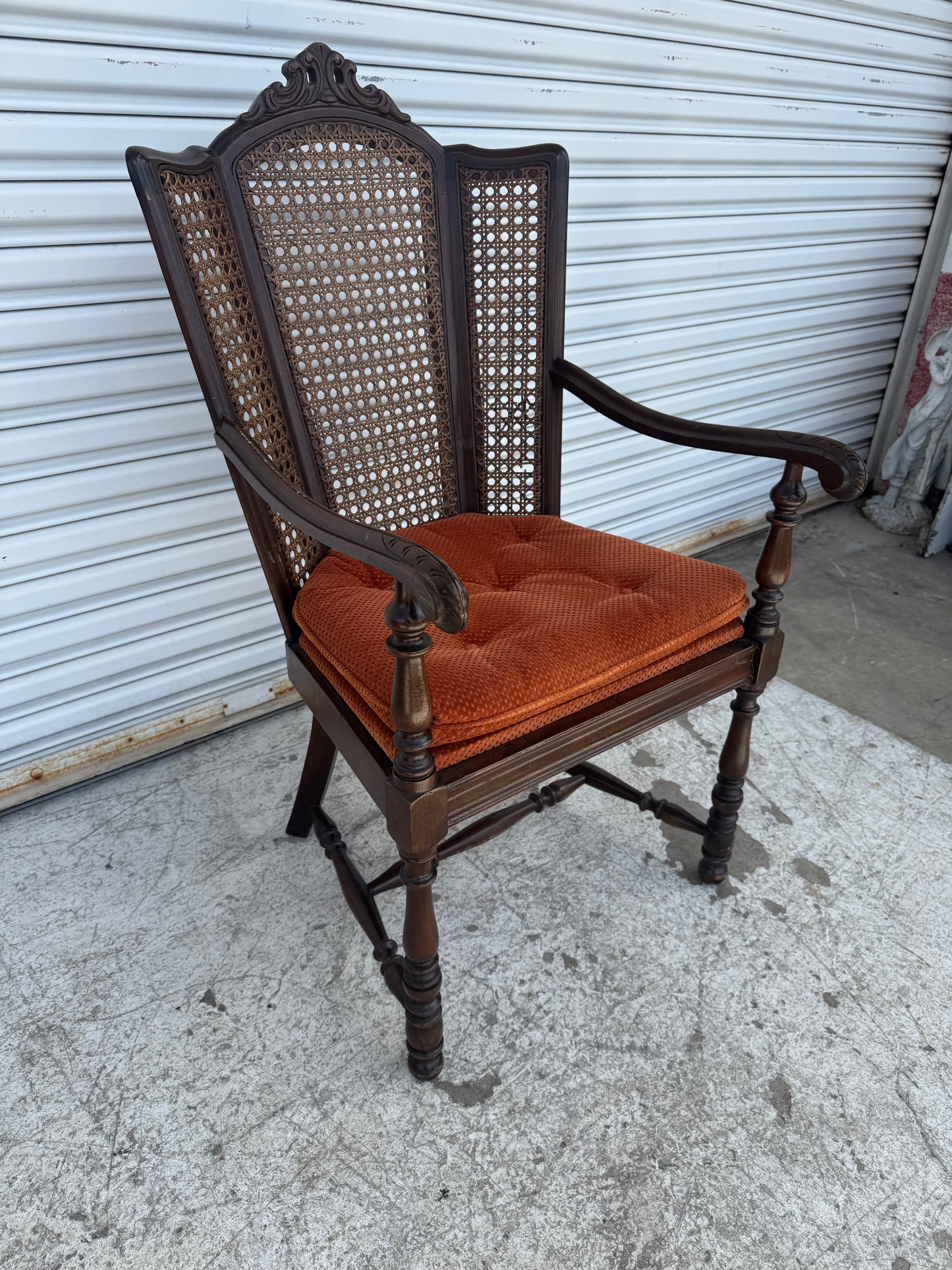 Antique Carved Wood Armchair with Cane Back