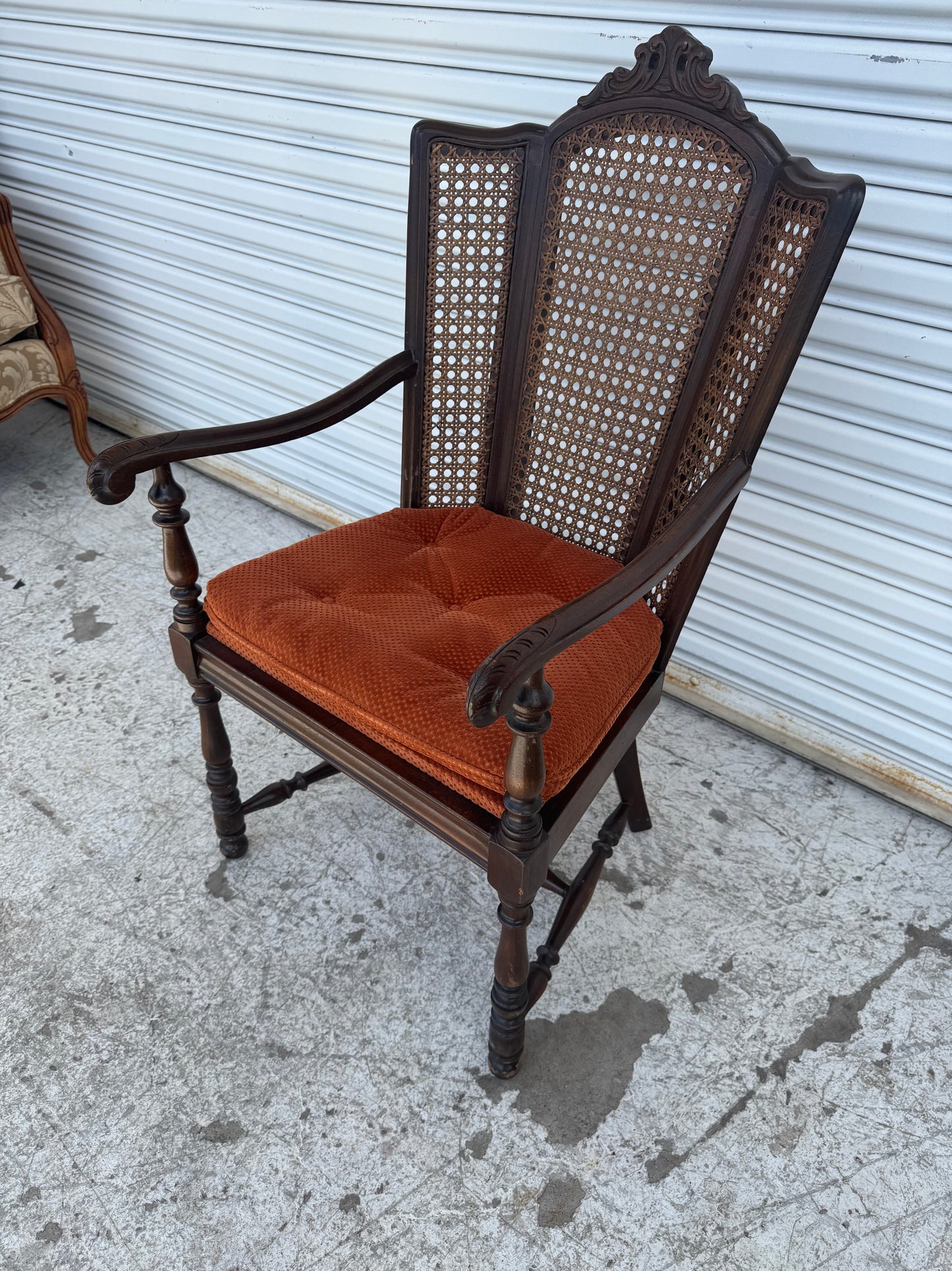 Antique Carved Wood Armchair with Cane Back