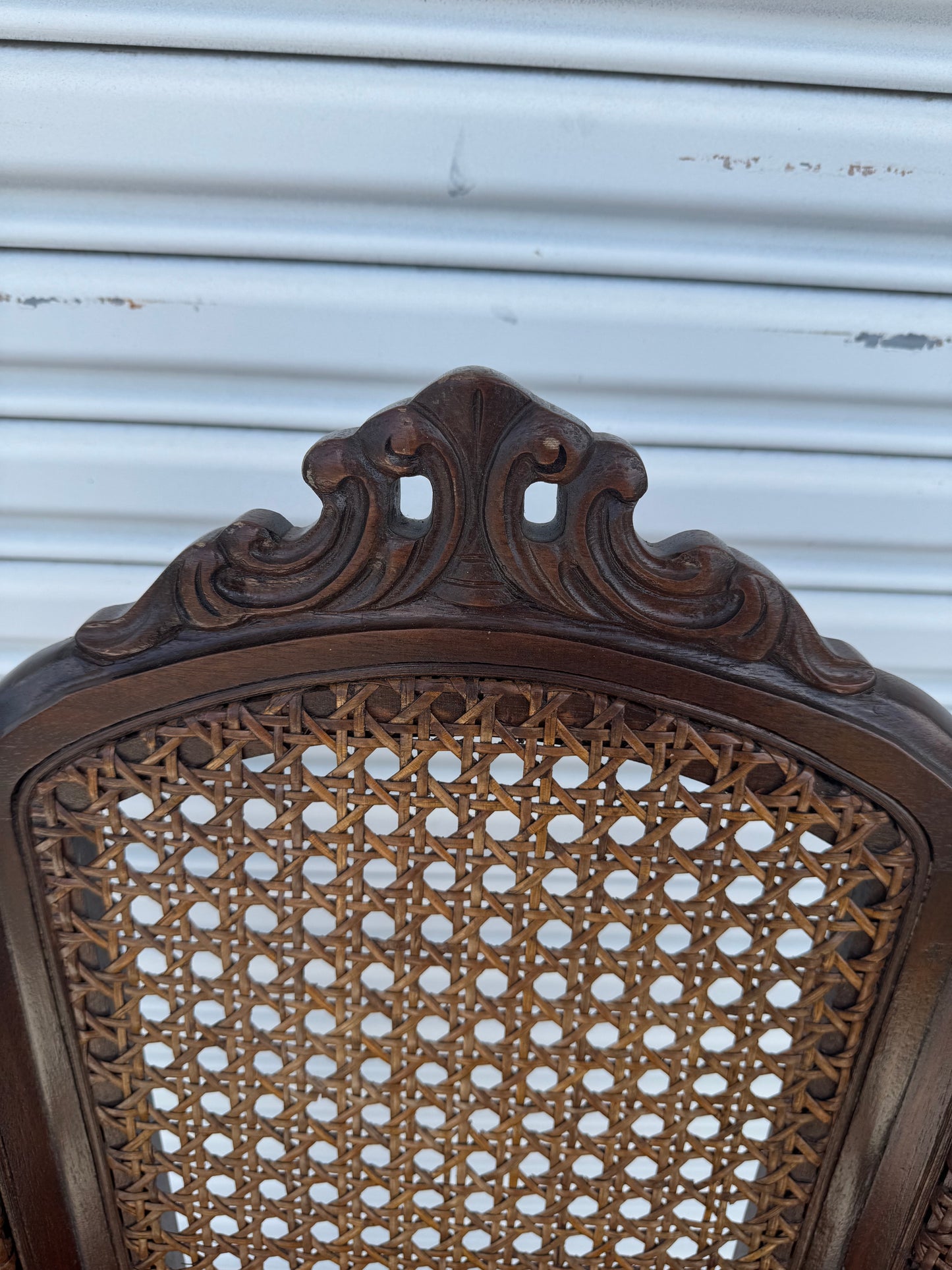 Antique Carved Wood Armchair with Cane Back