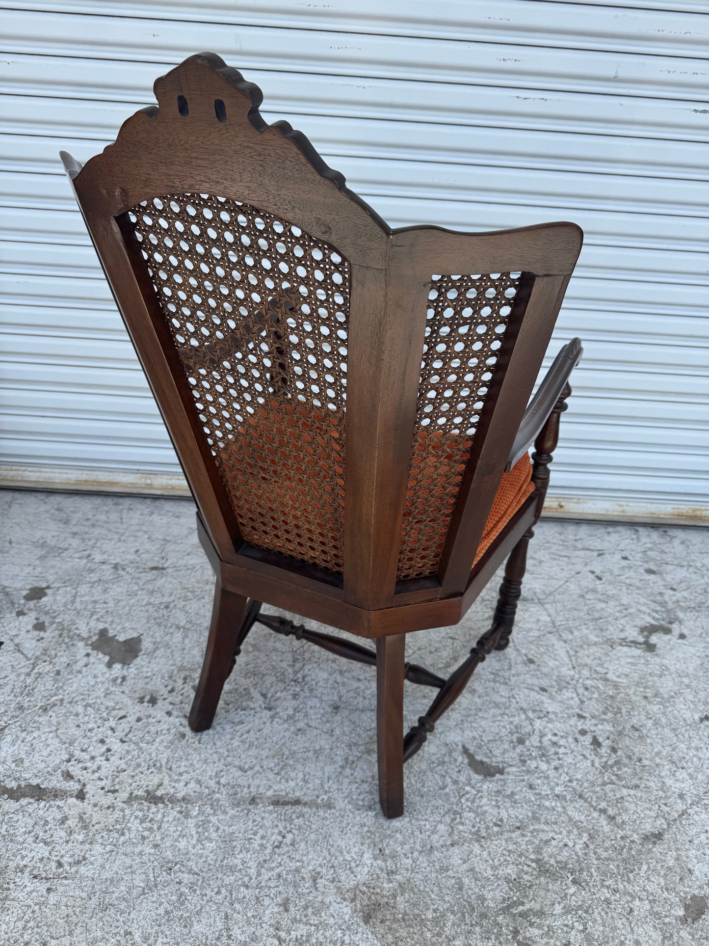 Antique Carved Wood Armchair with Cane Back