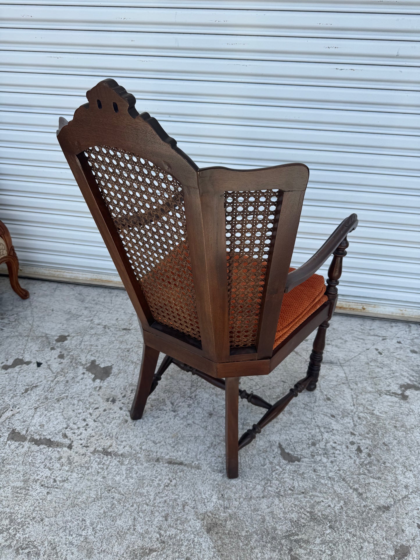 Antique Carved Wood Armchair with Cane Back