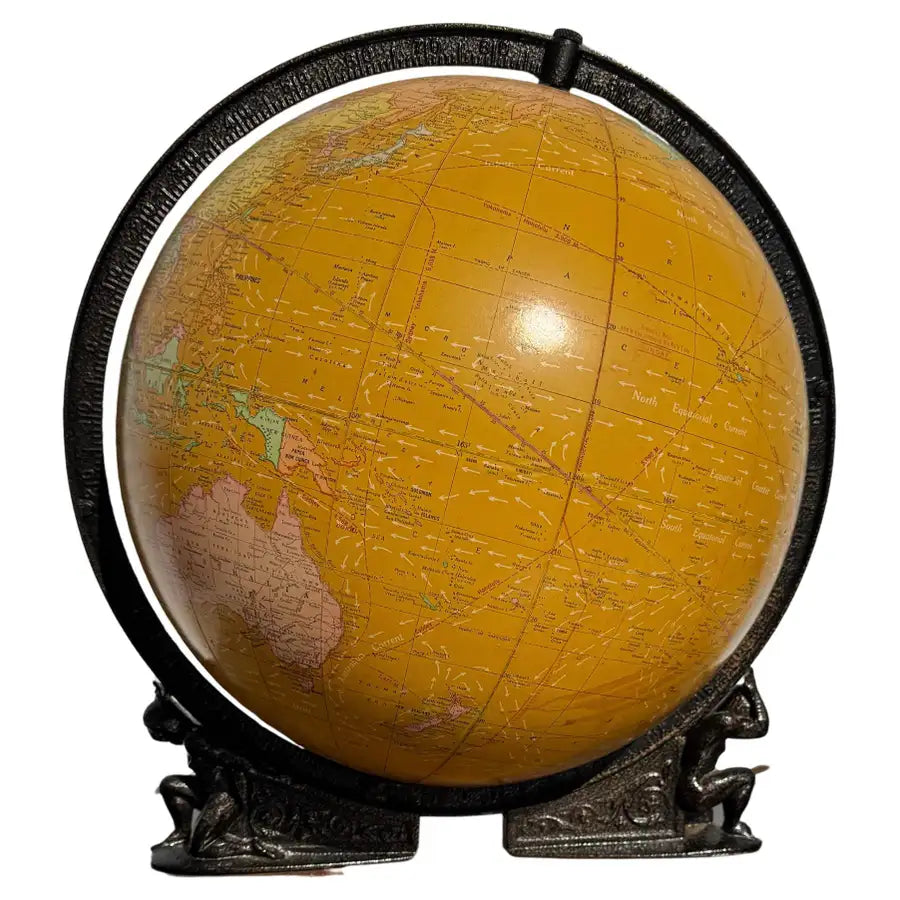 illuminated world globe with wooden stand and vintage map