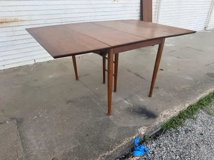 Walnut extension table with timeless modern design