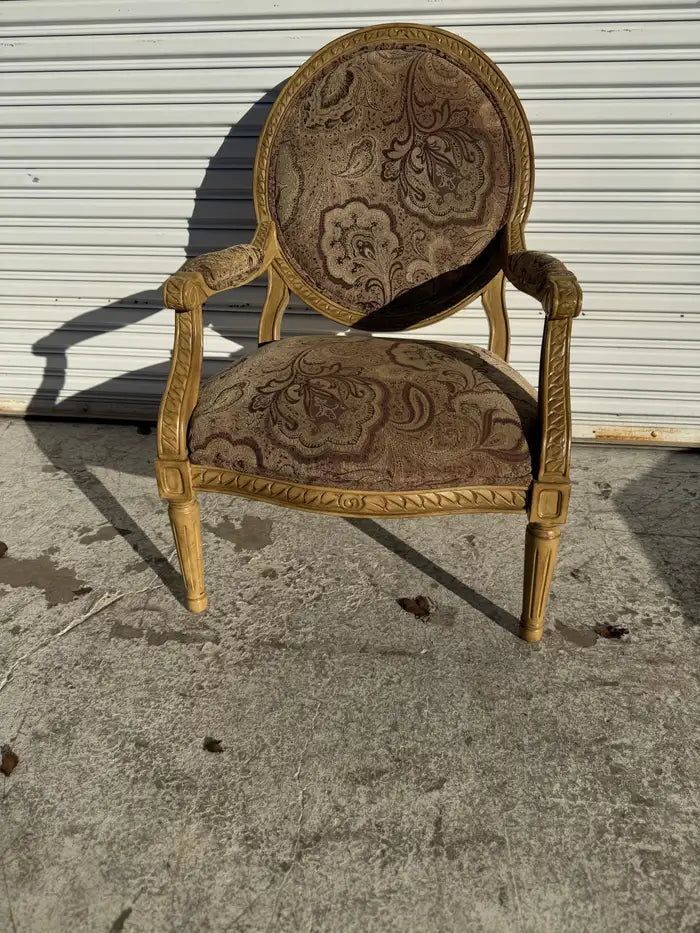 Upholstered Louis XVI chair with neoclassical wood detailing