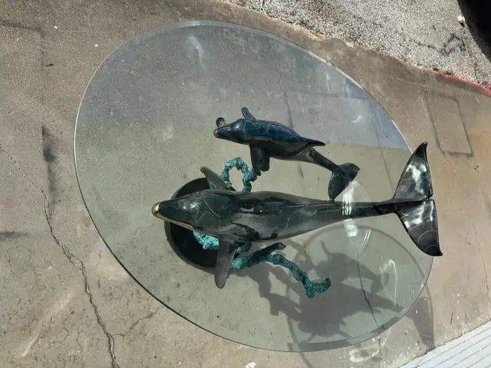 Marble surface with natural veining on dolphin table