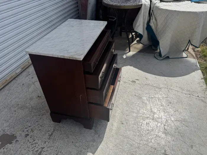 Marble top bedside table for sophisticated bedroom decor
