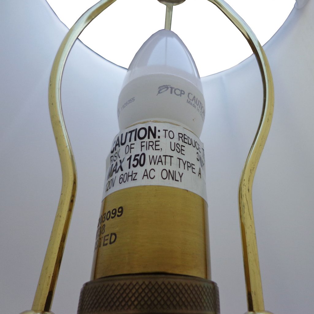 Antique-inspired crystal table lamps with white fabric shades