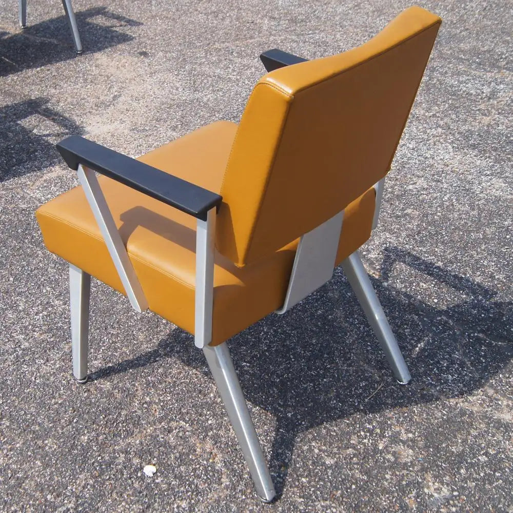 Mustard yellow vinyl mid-century modern armchair GF