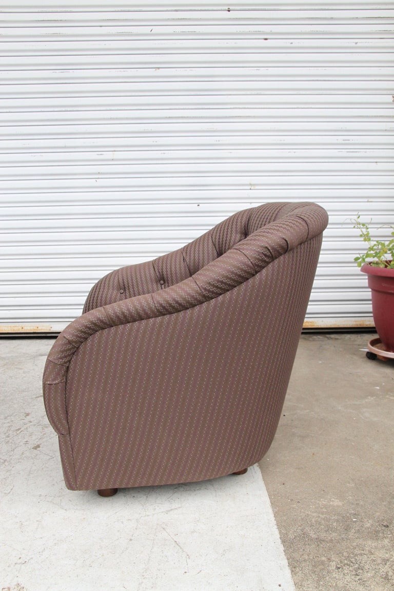 Mid-century designer lounge chair tufted detail