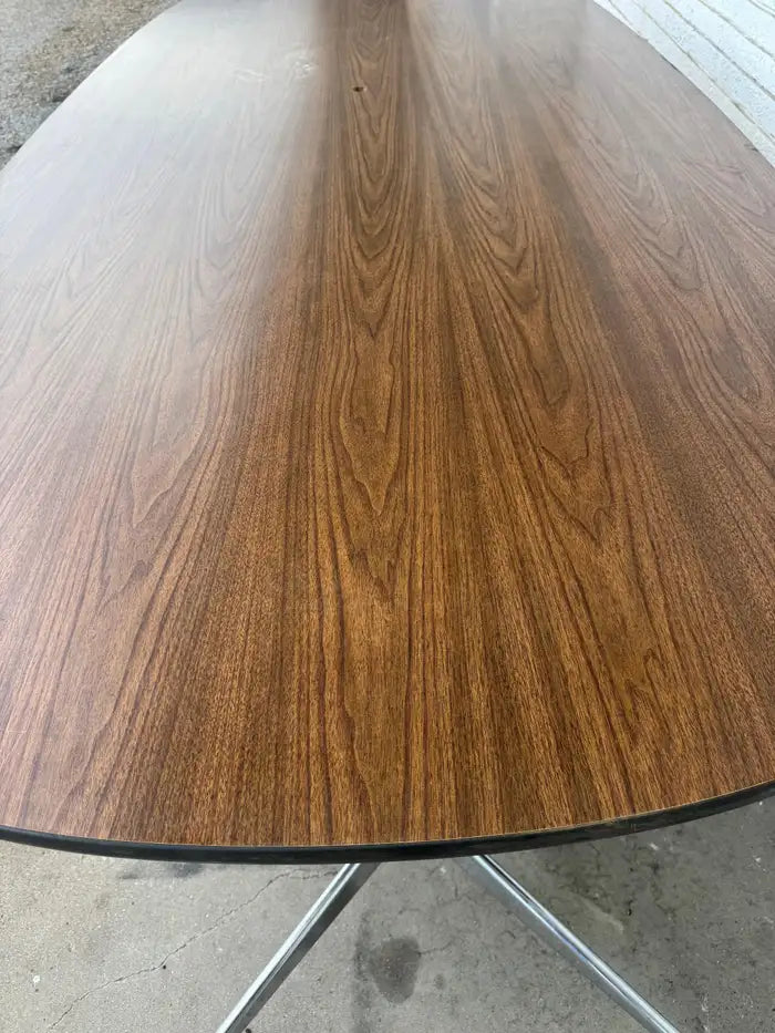 Herman Miller style meeting table with walnut veneer finish