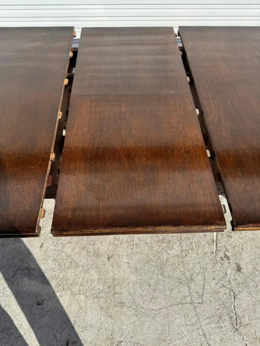 Mid century modern dining table with butterfly leaf mechanism