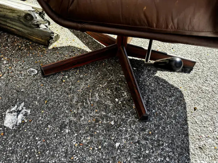 Brown leather executive swivel armchair