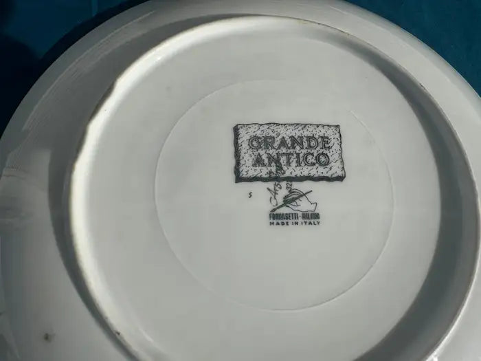 Collectible Fornasetti architectural motif plates