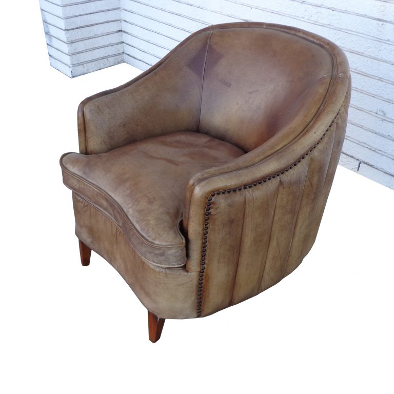 Cozy compact lounge chair brown upholstery