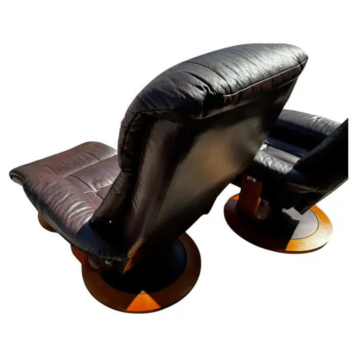 Mid century swivel chair and footrest in leather