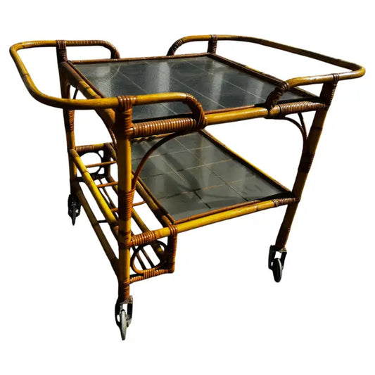 Vintage tiki bamboo bar cart with glass shelves