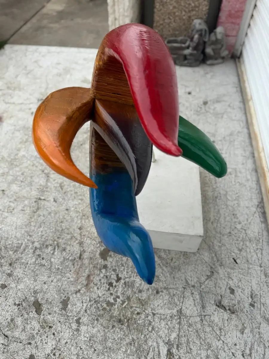 handcrafted wood art sculpture with flowing floral form