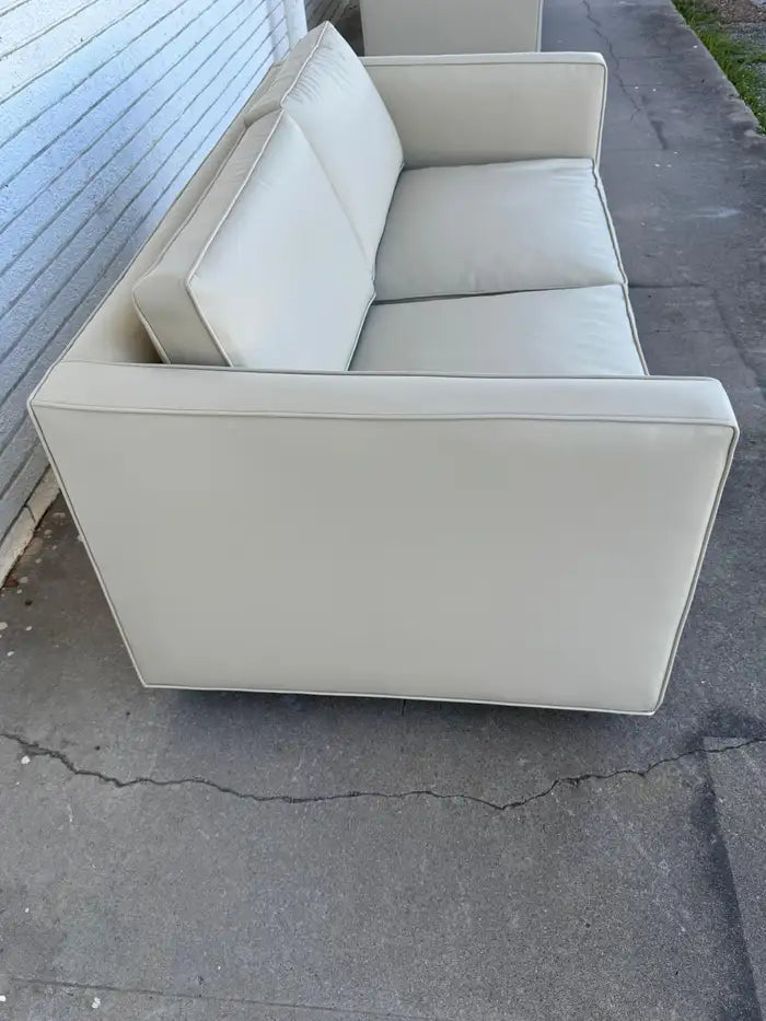 Designer upholstered loveseat in neutral ultra fabric