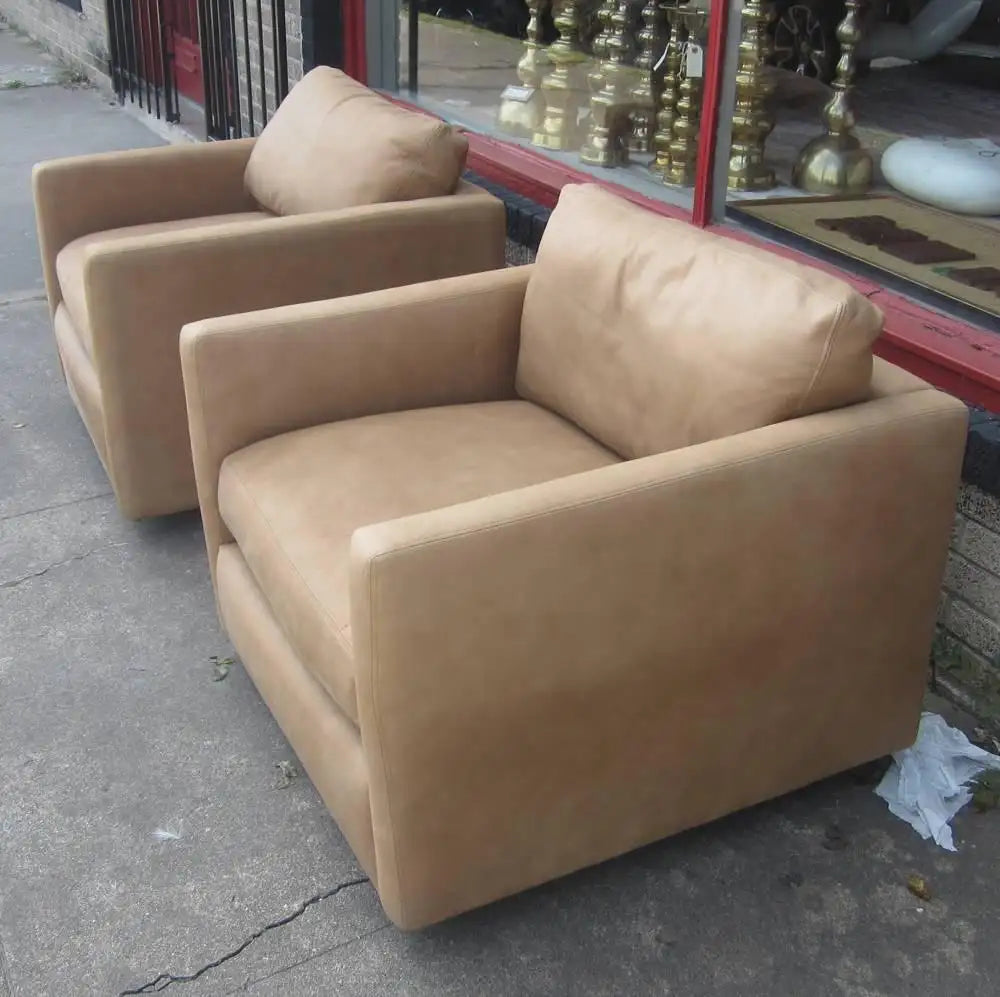 Modernist tan leather deep seat lounge chair pair
