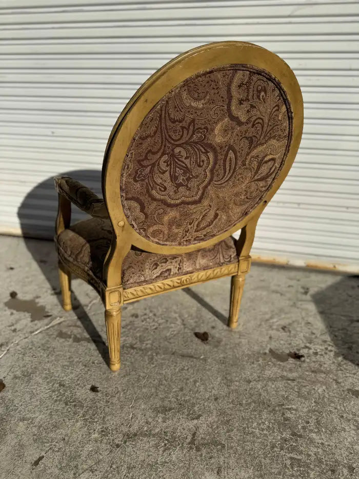 Hand carved Louis XVI bergere chair with refined craftsmanship