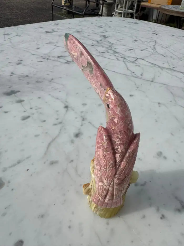 Pink quartz bird with marble pattern onyx base