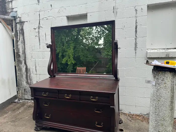Handcrafted antique dresser with elegant wood grain finish