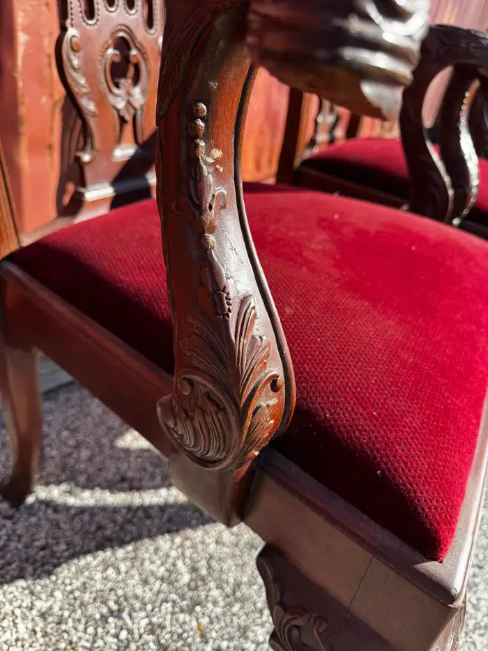Ornate carved mahogany accent armchairs