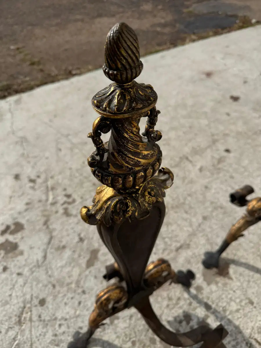 vintage fireplace tools with ornate iron scrollwork