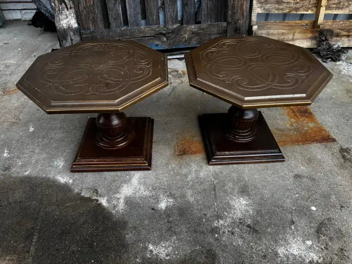 Pair of octagonal granite end tables with pedestal base