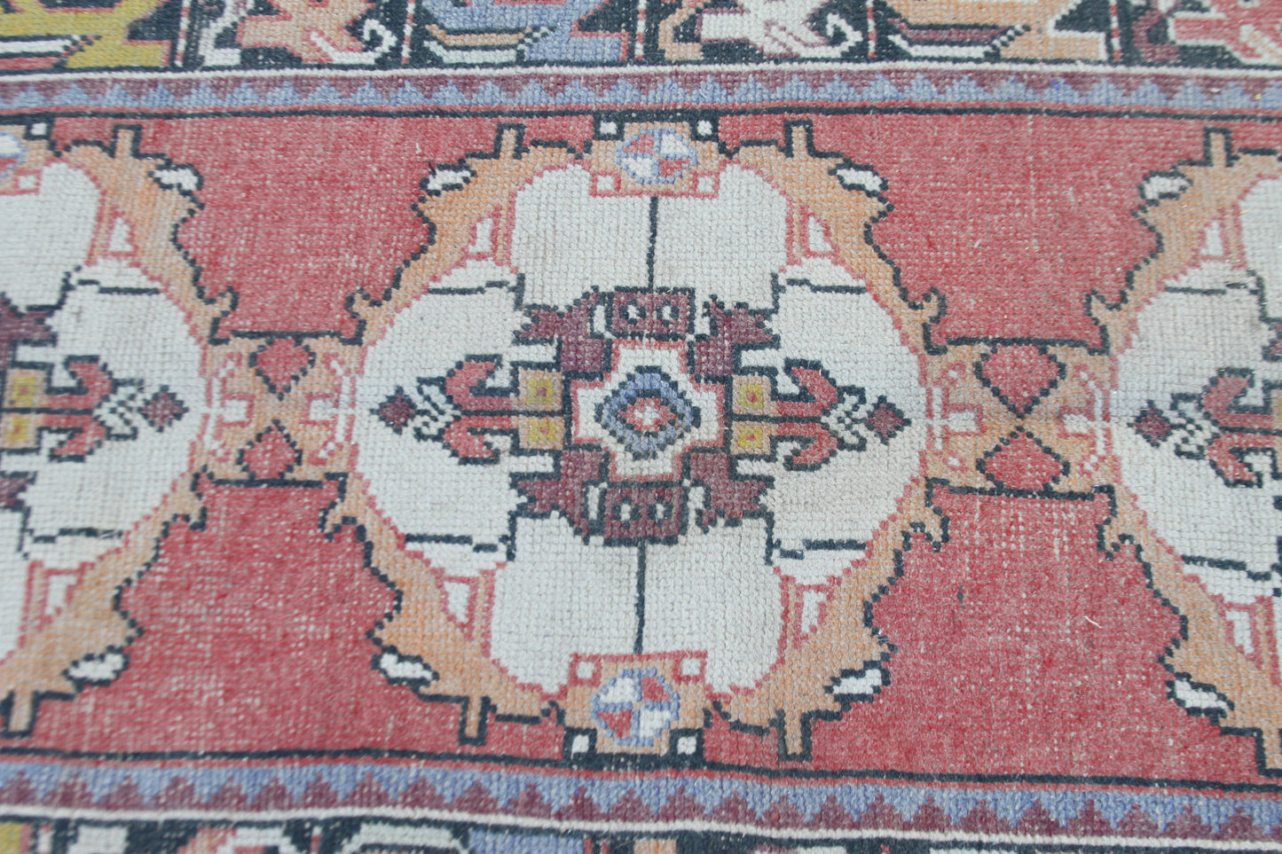 Decorative pink area rug in outdoor photo