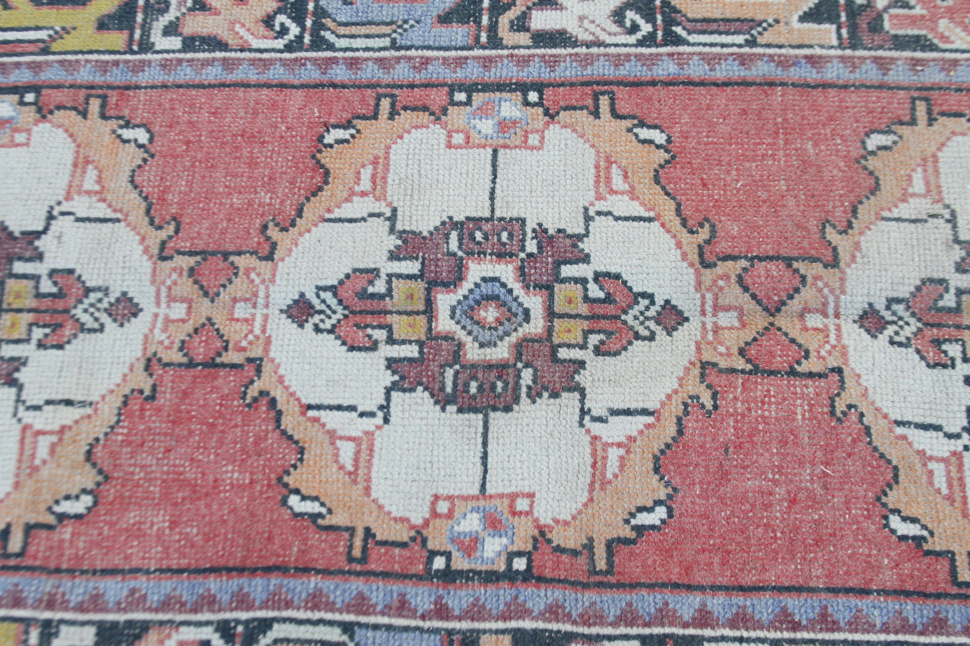 Decorative pink area rug in outdoor photo