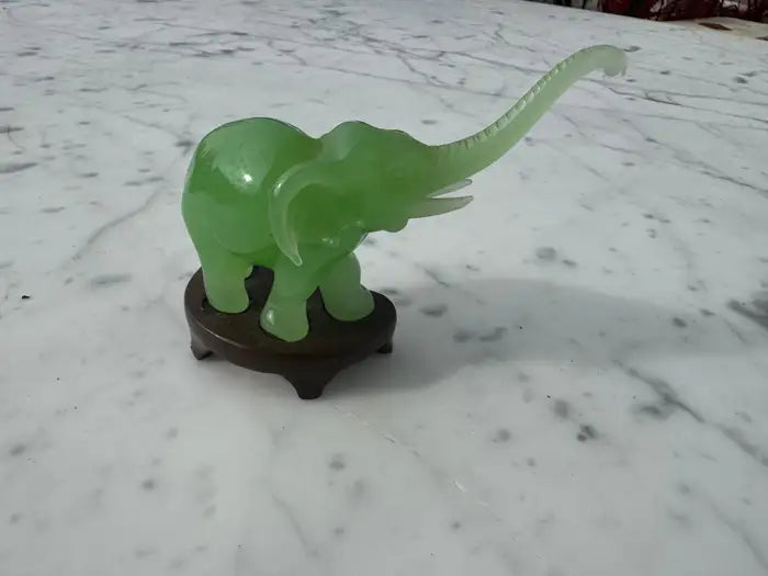 Green jadeite elephant figurine polished stone décor