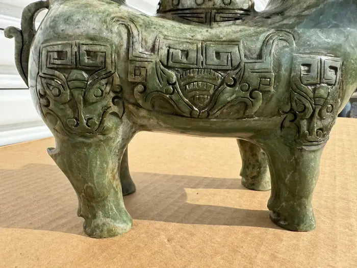 Incense burner carved from jade with organic patterns