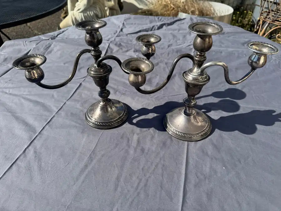 antique style silver candle holder with curved arms