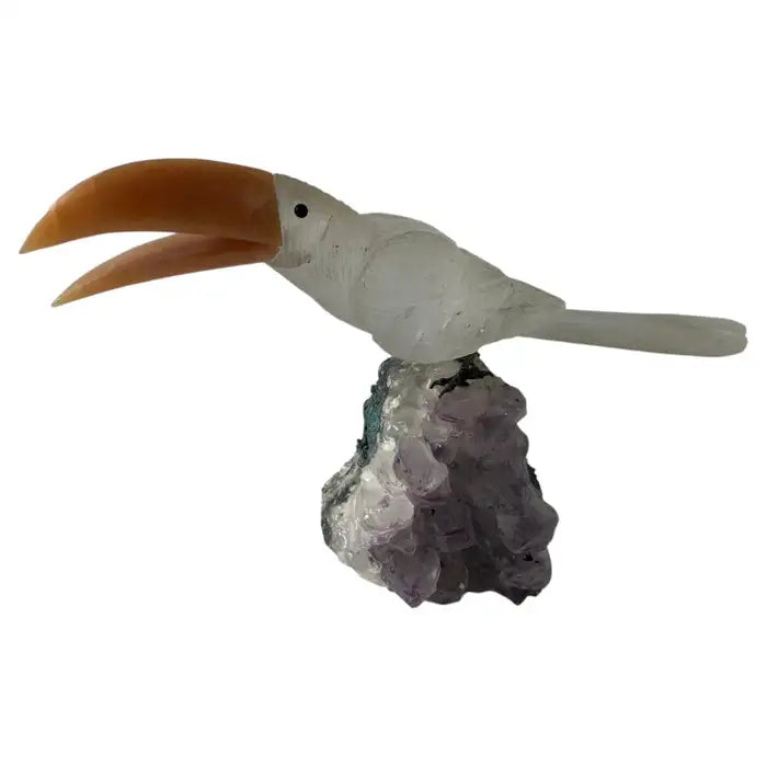 Natural quartz toucan sculpture on amethyst geode base