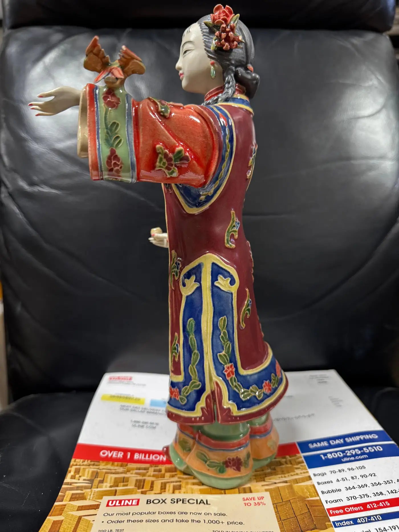 Vintage Asian porcelain statue with gold and blue enamel