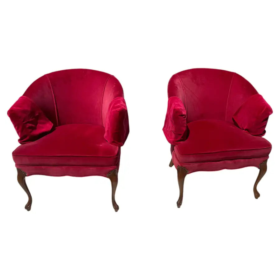 red velvet accent chairs with curved tub design