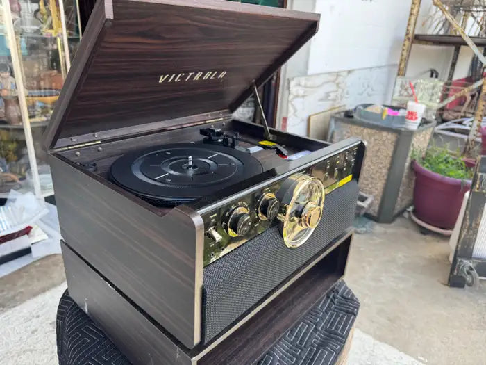 Retro audio cabinet with integrated record player design