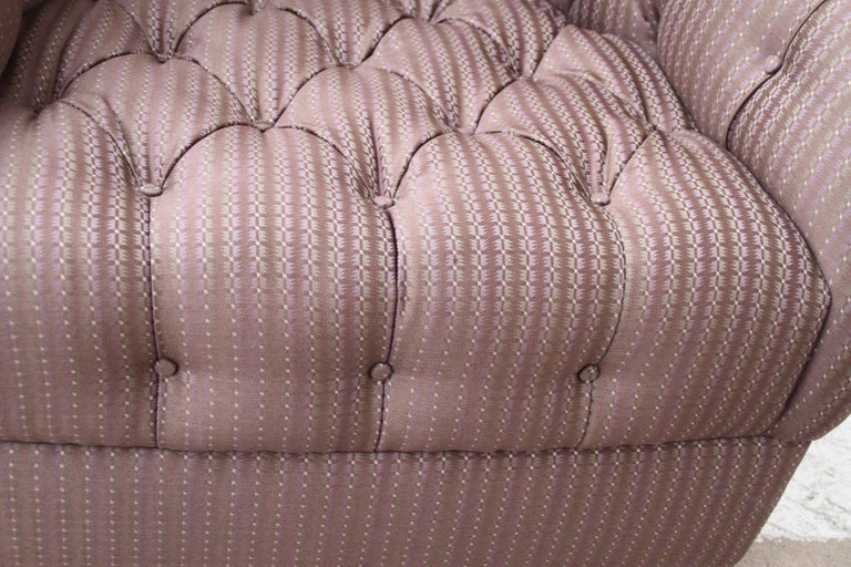 Sculptural tufted designer chair in living room