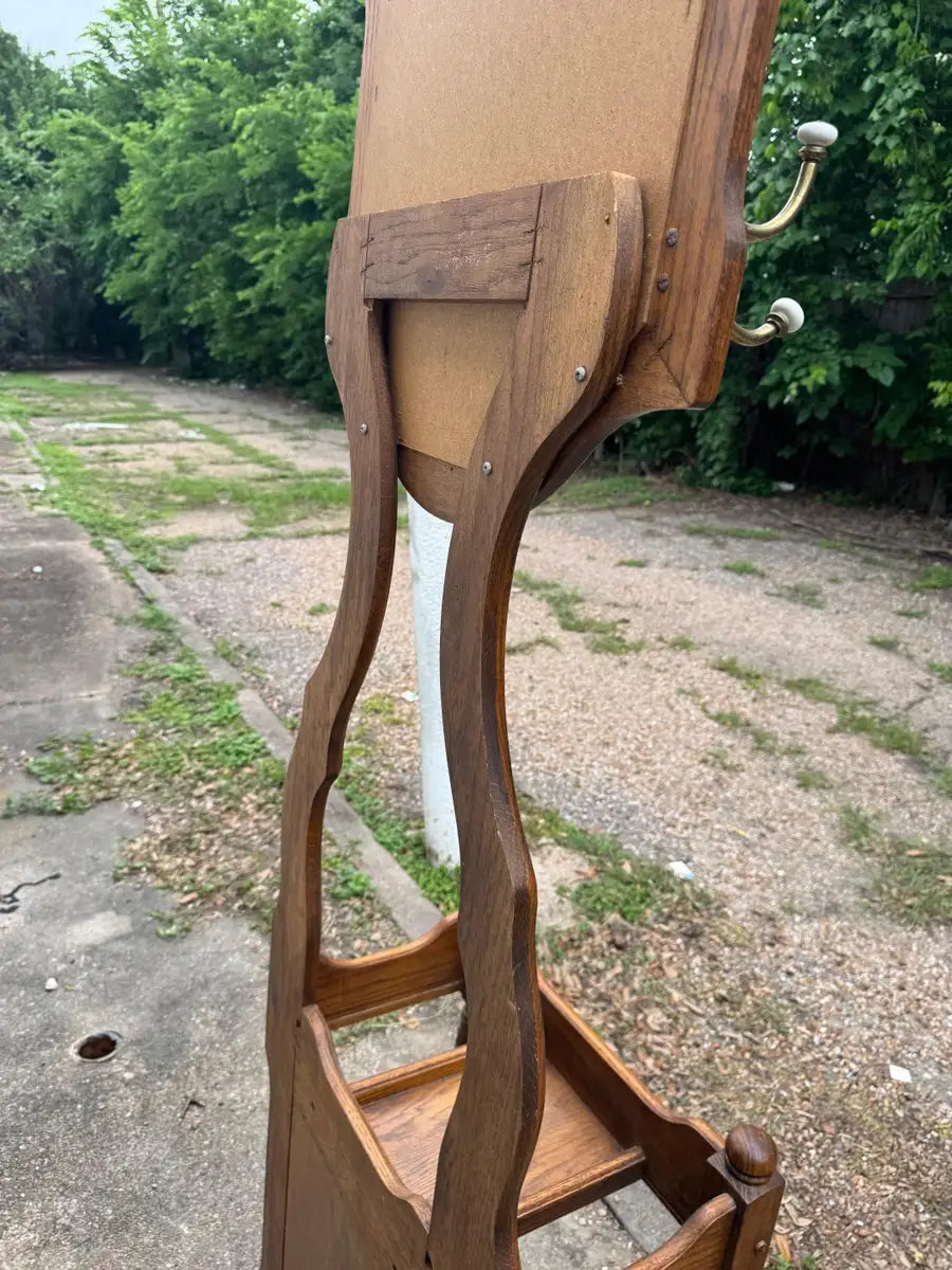 Handcrafted oak foyer hall tree with decorative wood details