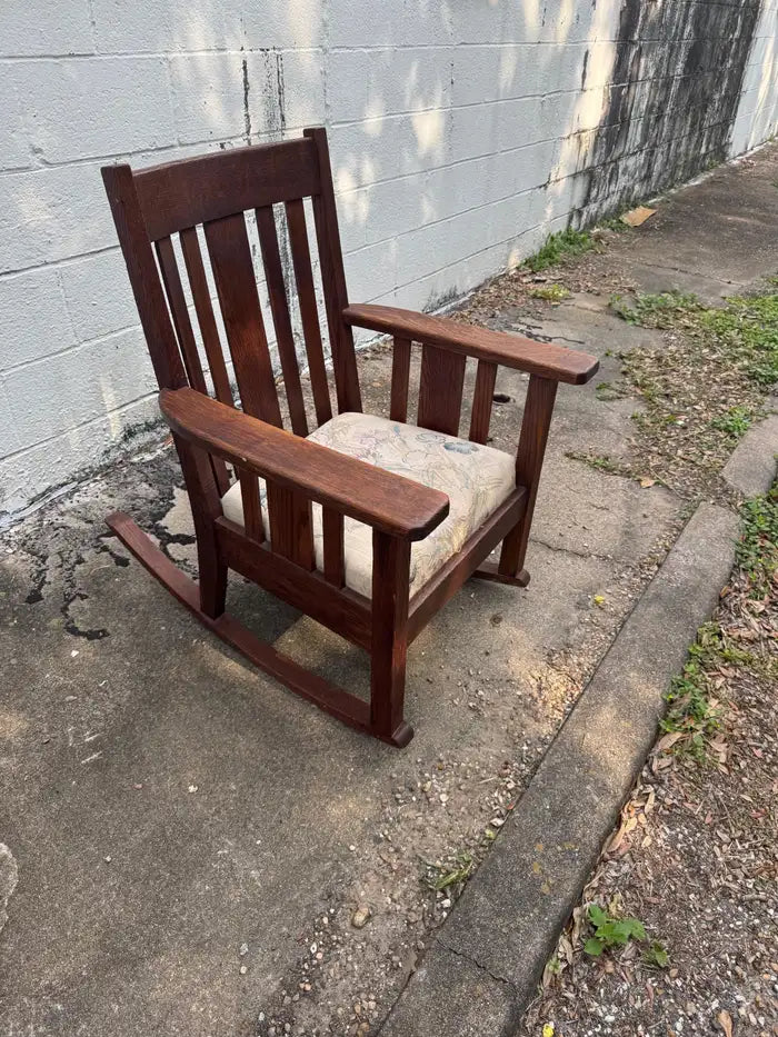 Handcrafted oak rocking chair with vintage wood grain