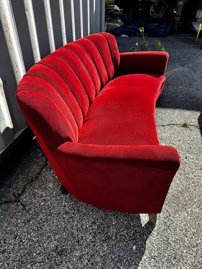 Scandinavian curved sofa with channel tufted back