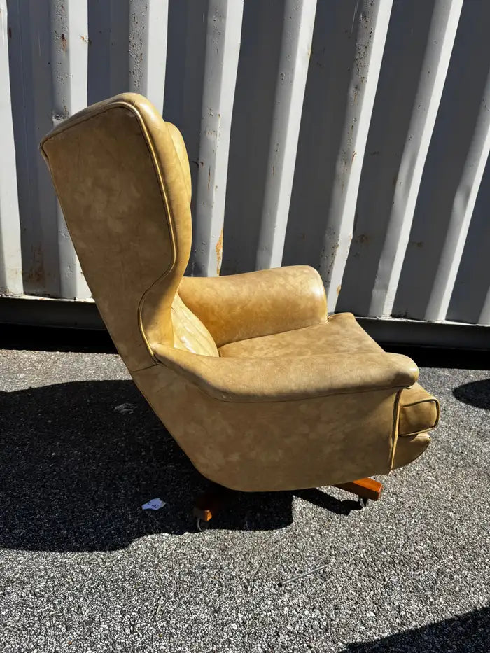 Tufted leather accent chair with matching ottoman