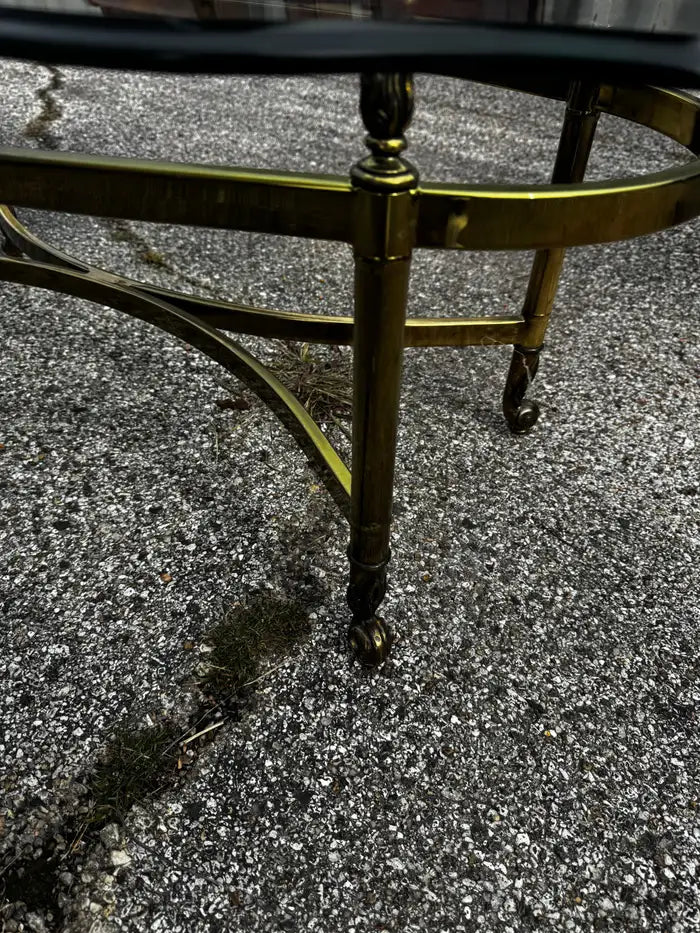 Oval glass coffee table brass detailing
