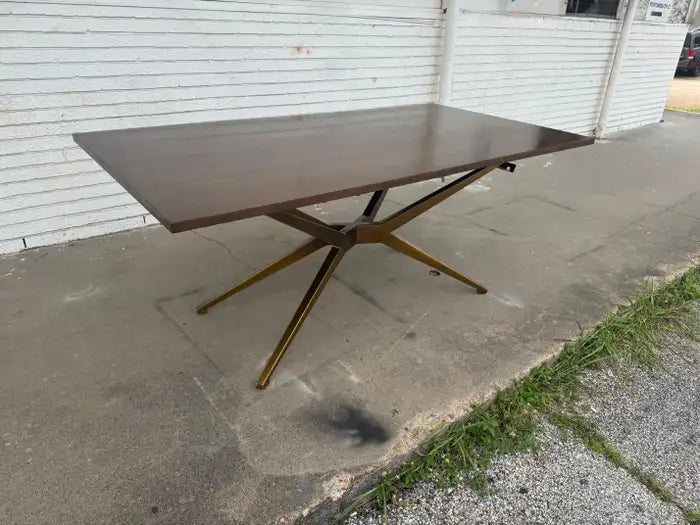 Vintage wood dining table with spider leg design