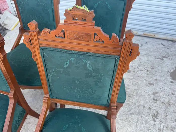 Traditional carved wood dining chairs with vintage character